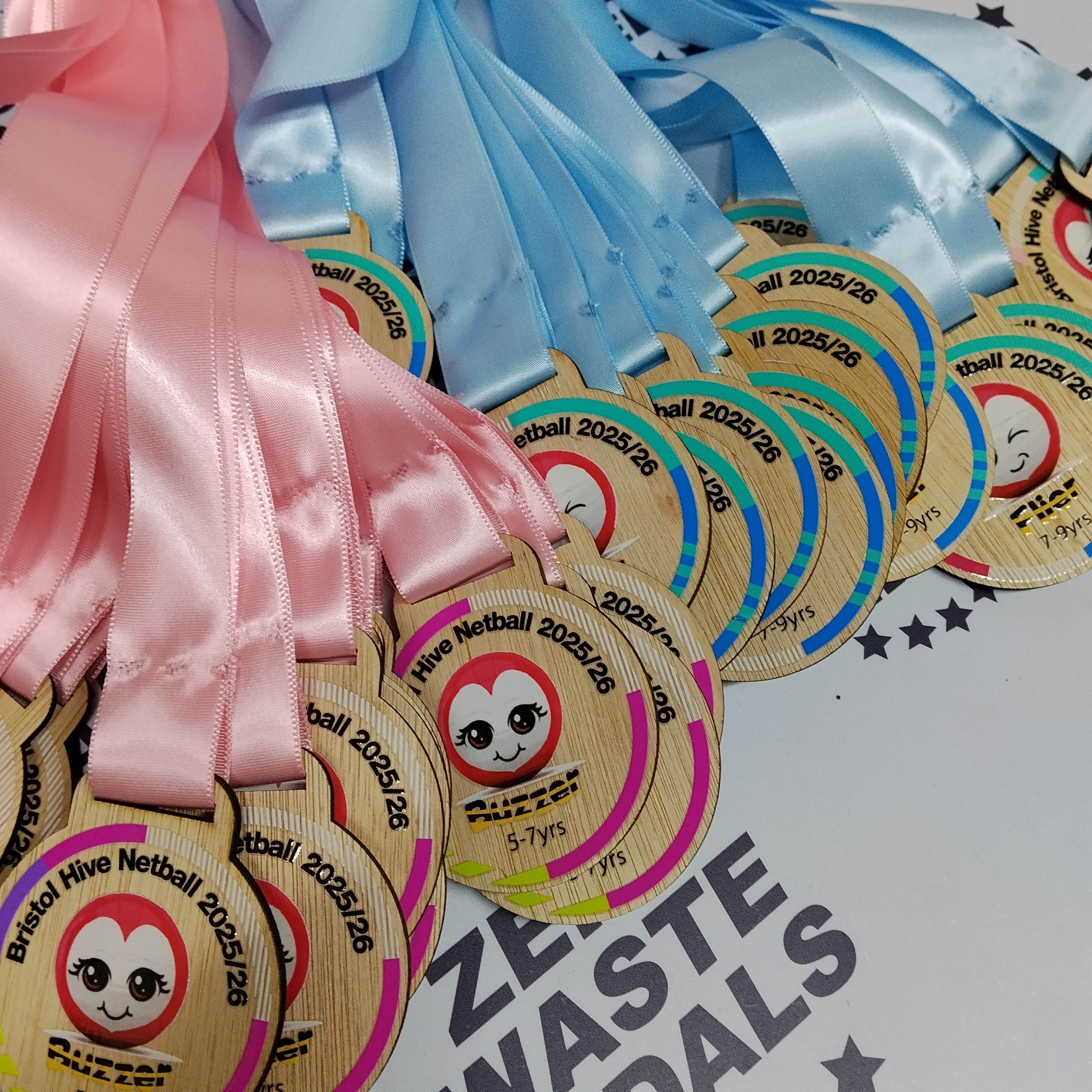 Custom wooden medal for Bristol Hive Netball